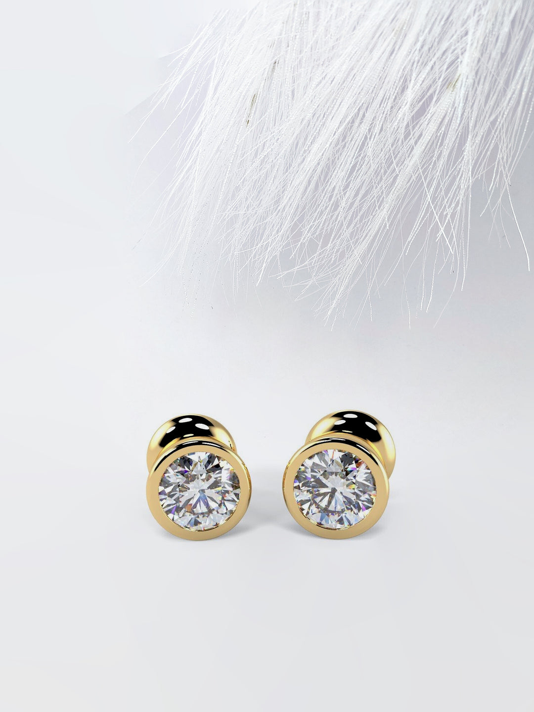Bezel Set Round Cut Moissanite Diamond Stud Earrings in Yellow Gold