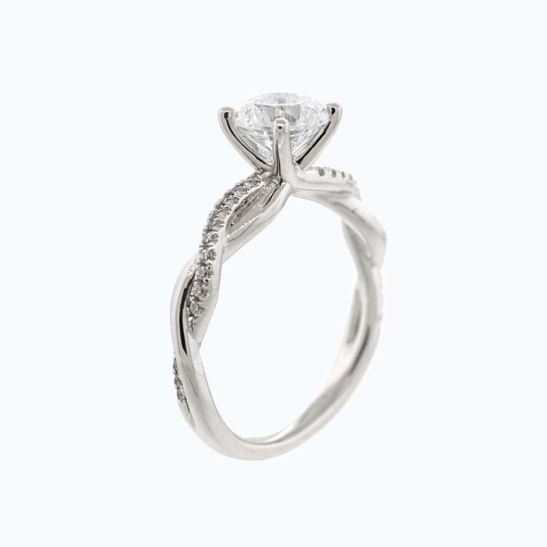 round-shaped-moissanite-solitaire-twisted-engagement-ring