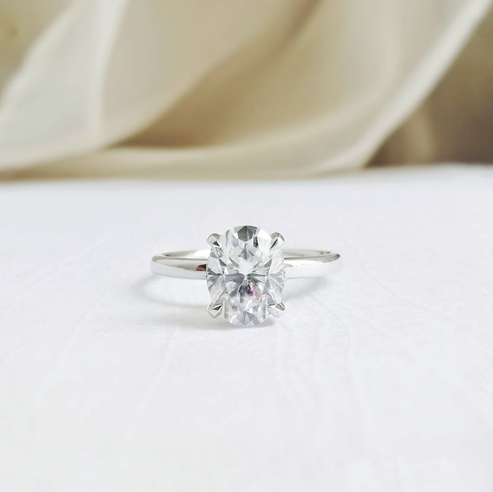 1-50-ct-oval-shaped-moissanite-hidden-halo-engagement-ring