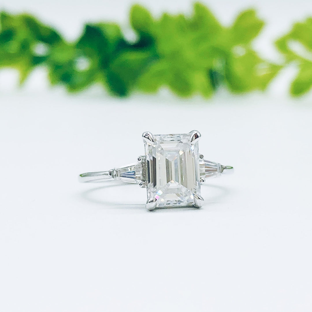 1-9-ct-emerald-cut-three-stone-moissanite-engagement-ring