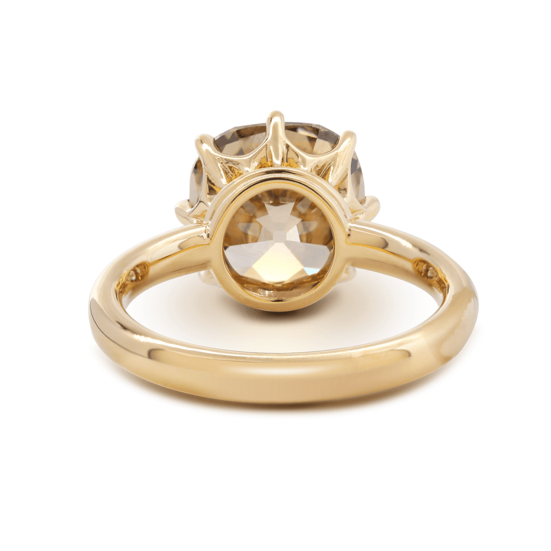 This champagne diamond ring suits brides looking for 3.0ct-4.0ct cushion old mine-cut brown diamond engagement ring