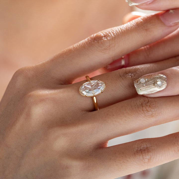 Lab grown diamond ring with a floating setting, styled as a solitaire engagement ring