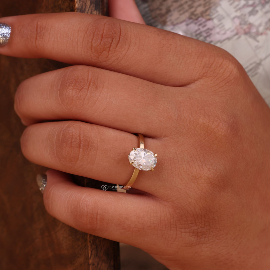 Solitaire Diamond Ring
14K Gold Oval Moissanite
18K Gold Solitaire Ring
Platinum Oval Moissanite
D Color Oval Moissanite
