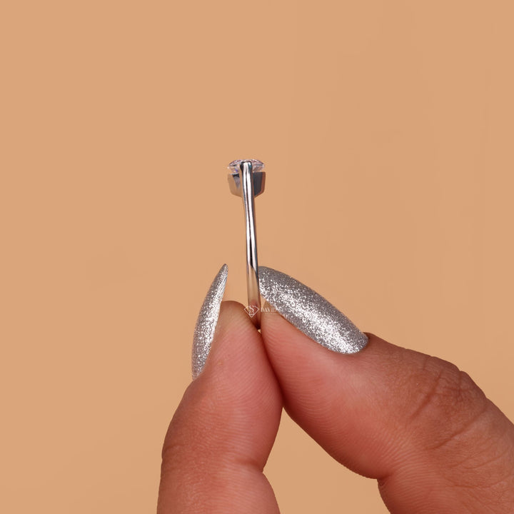 Yellow gold marquise
Rose gold moissanite
