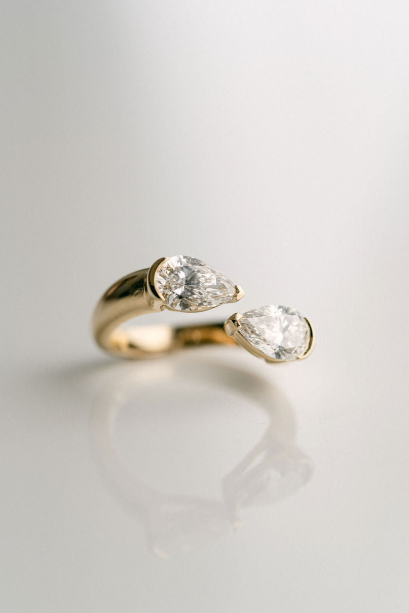 Pear classic diamond ring, Pear modern diamond ring, Pear three-stone diamond ring, Pear side stone diamond ring, Pear cathedral diamond ring, Pear bezel diamond ring,