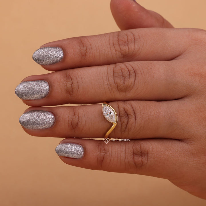 East West Solitaire Ring
Marquise Moissanite Band
Wave Style Diamond Ring
1.5 Carat Marquise Cut
