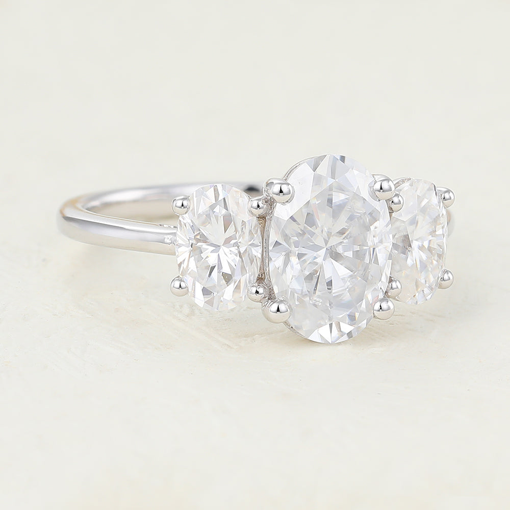 oval-shaped-moissanite-three-stone-engagement-ring