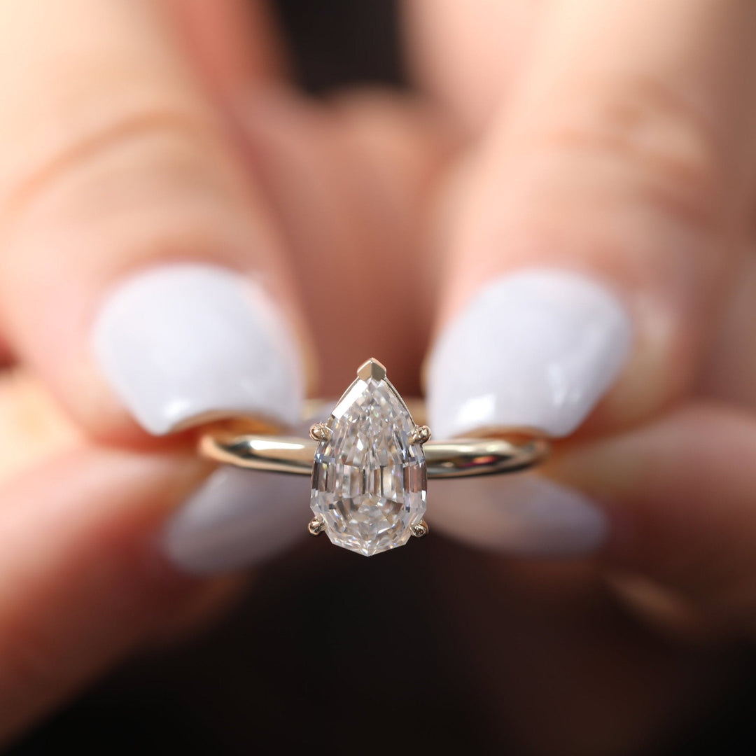 Pear Step Cut Ring
2 Carat Moissanite
3 Carat Pear Cut
Step Cut Moissanite
Pear Diamond Alternative
