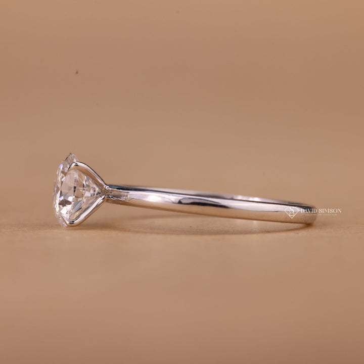 White gold round cut engagement ring
Platinum solitaire moissanite ring
Timeless round cut diamond ring
Sparkling moissanite solitaire ring
Elegant round cut engagement ring