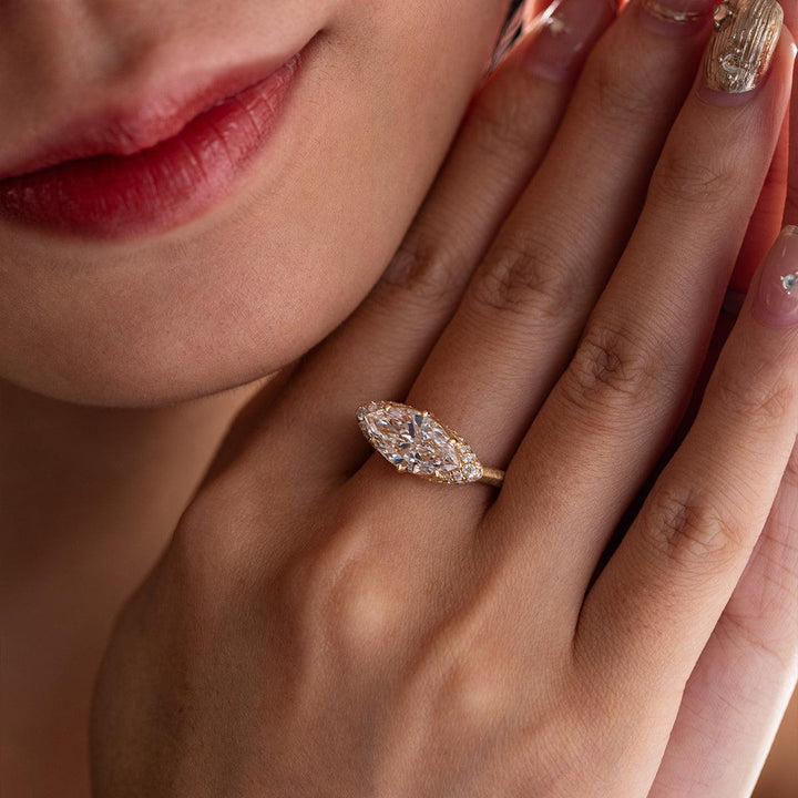 East-West diamond setting, cathedral shank ring, marquise solitaire, modern marquise ring, 2.5ct diamond ring, elongated marquise cut, architectural ring design, bespoke engagement ring,