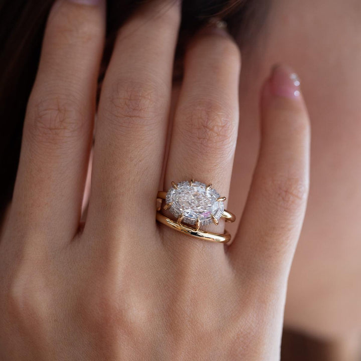 bespoke engagement ring, luxury oval solitaire, designer diamond ring, 360 degree pavé, hidden halo oval, rounded pavé setting, 2.5 carat oval, elongated oval diamond, high brilliance oval, modern engagement ring