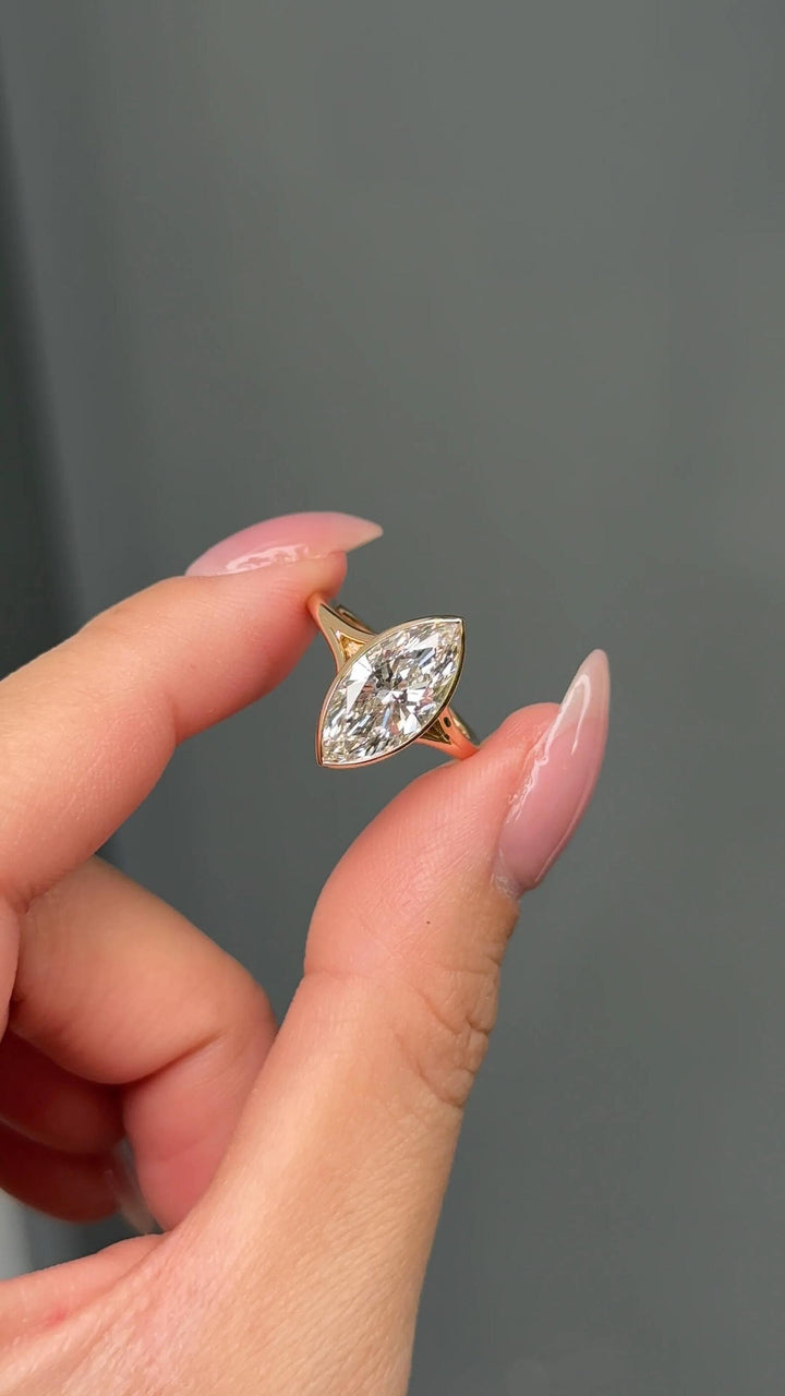 Conflict Free Diamond
Marquise Anniversary Ring
Premium Lab Diamond
Unique Marquise Ring
Protective Bezel Setting
Marquise Wedding Ring
Luxury Proposal Ring
3.5 Carat Marquise
Handcrafted Diamond Ring
Architectural Ring Design
Marquise Shape Jewelry
Lab Grown Marquise Cut
