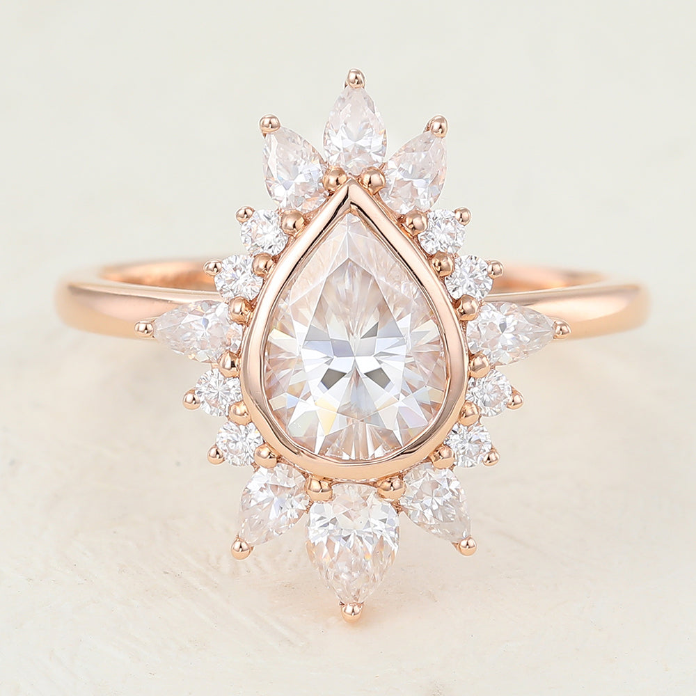 pear-shaped-moissanite-cluster-halo-engagement-ring