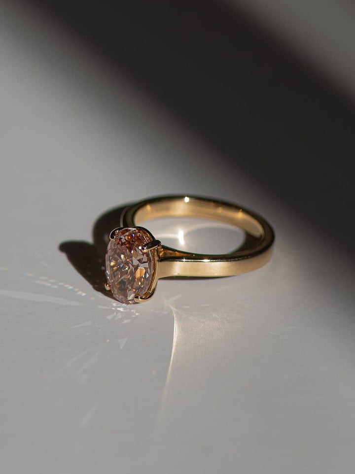 Pink Diamond Alternative
Oval Moissanite Ring
Heavy Band Engagement
Lab Grown Diamond Accents
Wide Band Ring
