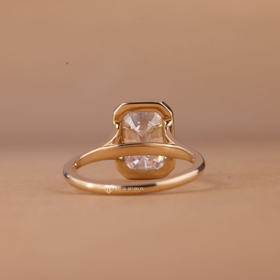 Emerald Cut Moissanite
Lab Diamond Bezel Ring
14K Gold Bezel Moissanite
18K Gold Emerald Solitaire
Platinum Bezel Set Ring
