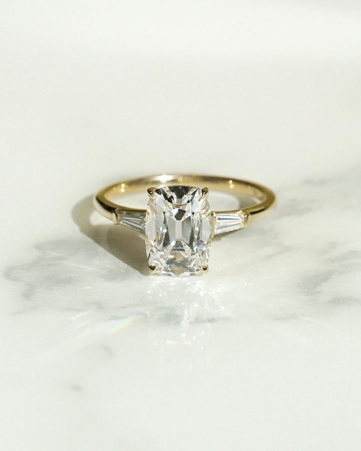Old Mine Cushion Cut
Three Stone Ring
3 Carat Moissanite
2.5 Carat Cushion Cut
Trilogy Engagement Ring
