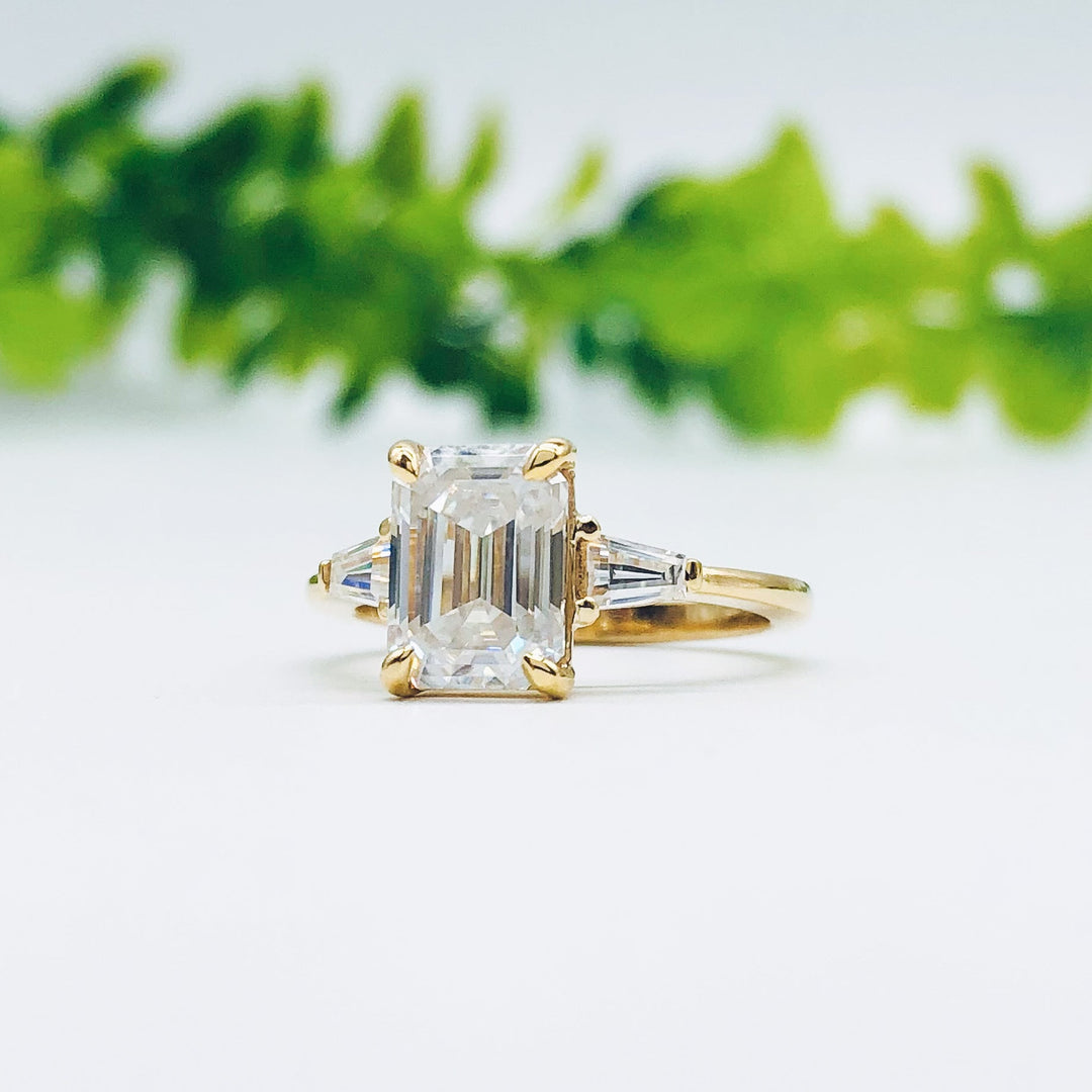 1-9-ct-emerald-cut-three-stone-moissanite-engagement-ring