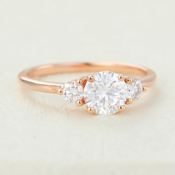 round-shaped-moissanite-three-stone-engagement-ring