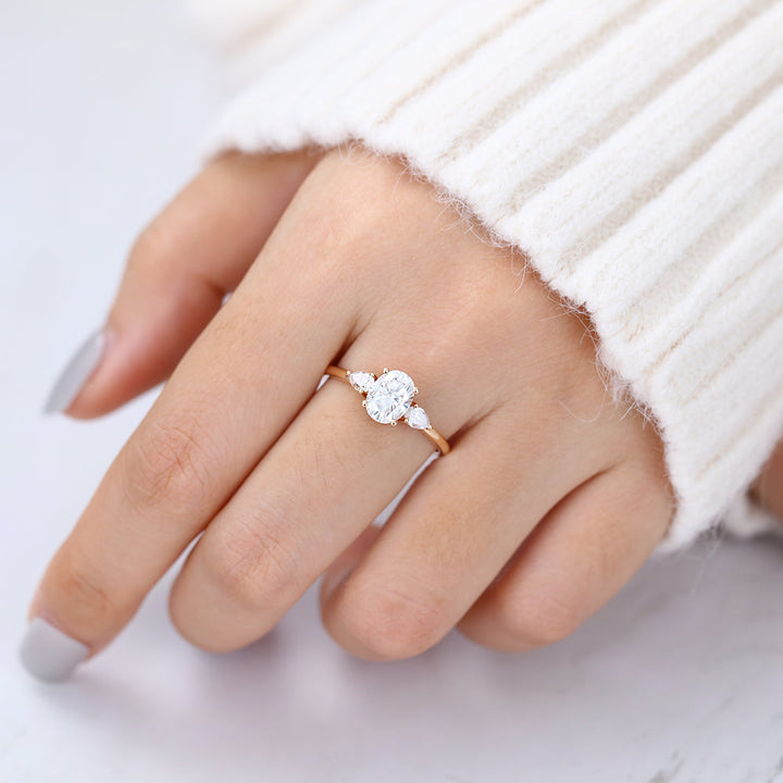 oval-shaped-moissanite-three-stone-engagement-ring