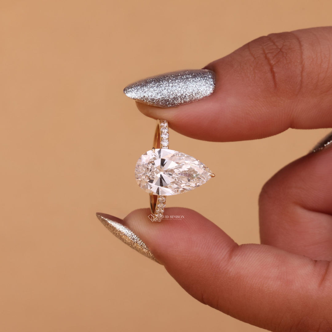 Teardrop Hidden Halo
14K Gold Pear Ring
Ethical Engagement Ring
VVS1 Pear Moissanite
