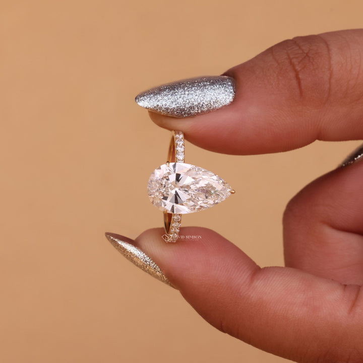 Teardrop Hidden Halo
14K Gold Pear Ring
Ethical Engagement Ring
VVS1 Pear Moissanite
