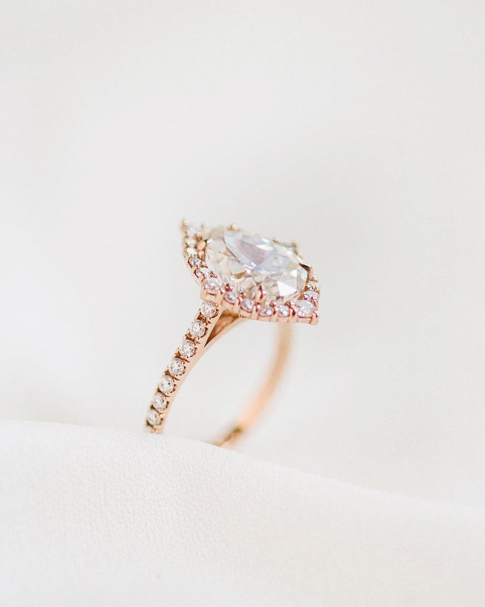pear-cluster-halo-moissanite-engagement-ring