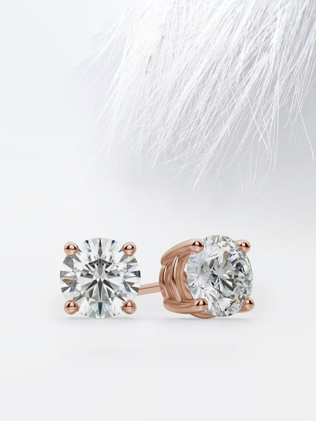 Round Cut Moissanite Stud Diamond Earrings in Rose Gold