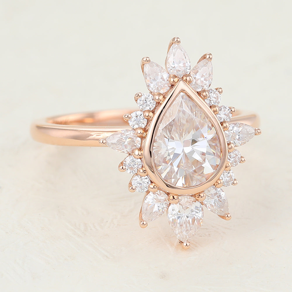 pear-shaped-moissanite-cluster-halo-engagement-ring