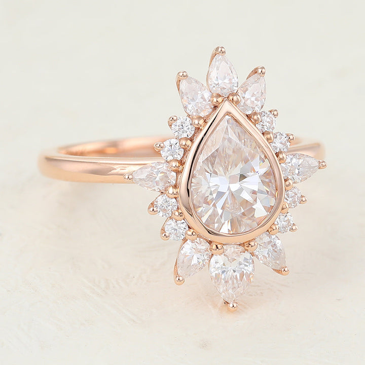 pear-shaped-moissanite-cluster-halo-engagement-ring