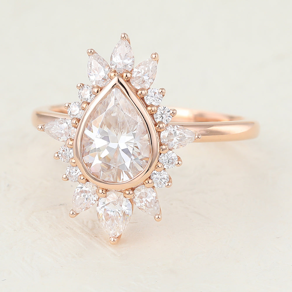 0-57-ct-pear-shaped-moissanite-cluster-halo-engagement-ring