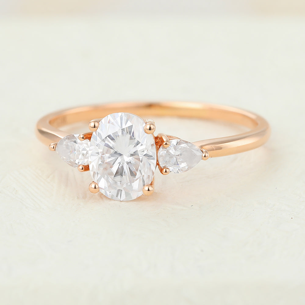 oval-shaped-moissanite-three-stone-engagement-ring