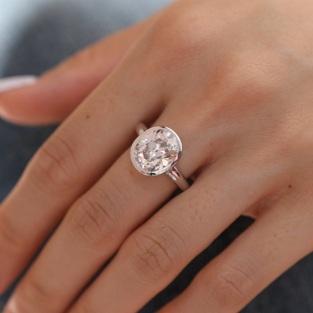 3 Carat Moissanite
4 Carat Moissanite
Antique Style Ring
Vintage Cushion Cut
Elongated Moissanite Bezel
Gold Bezel Ring
