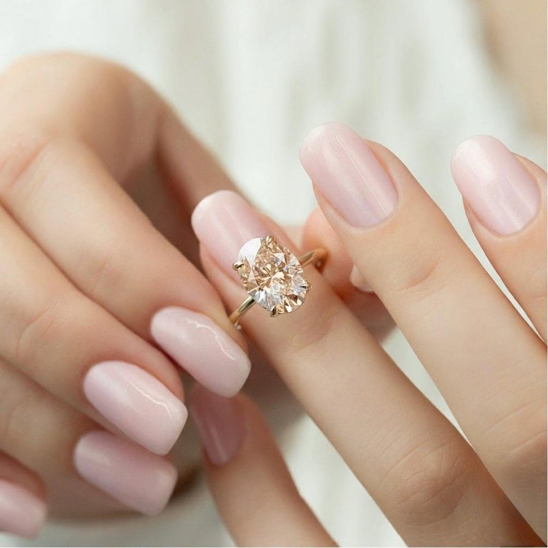 Sustainable Luxury Ring
Elongated Oval Cut
Fancy Color Moissanite
Boho Engagement Ring
Champagne Wedding Ring
Statement Solitaire
Affordable Luxury Jewelry
