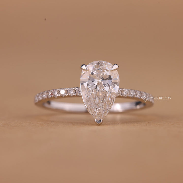 Pear Cut Promise Ring
White Gold Pear Moissanite
Rose Gold Pear Moissanite
