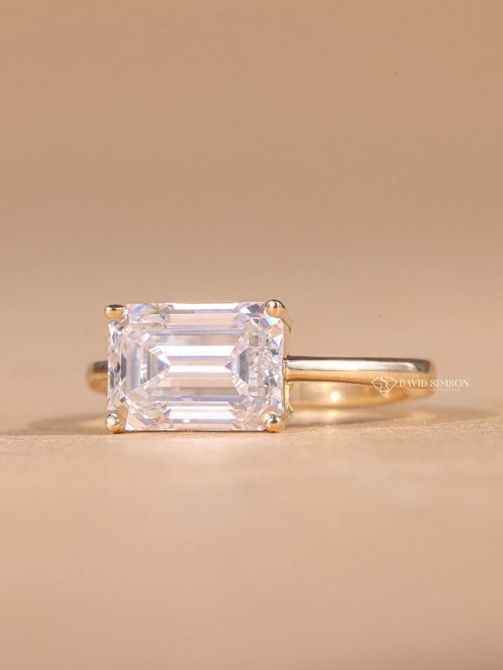 Luxury East-West engagement rings, Unique East-West diamond rings.