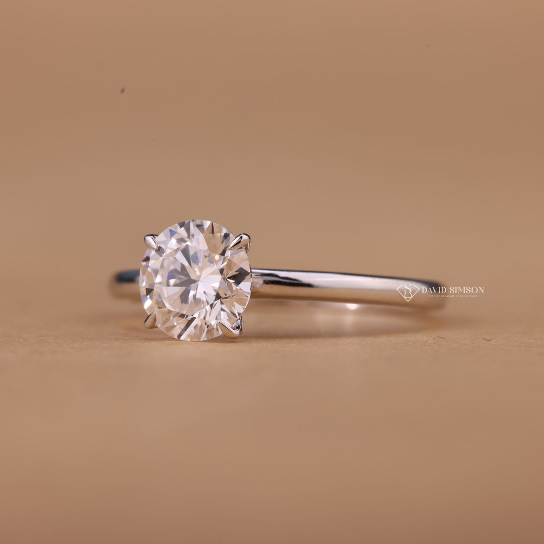 Timeless round cut diamond ring
Sparkling moissanite solitaire ring
Elegant round cut engagement ring
Lab-created moissanite diamond ring
