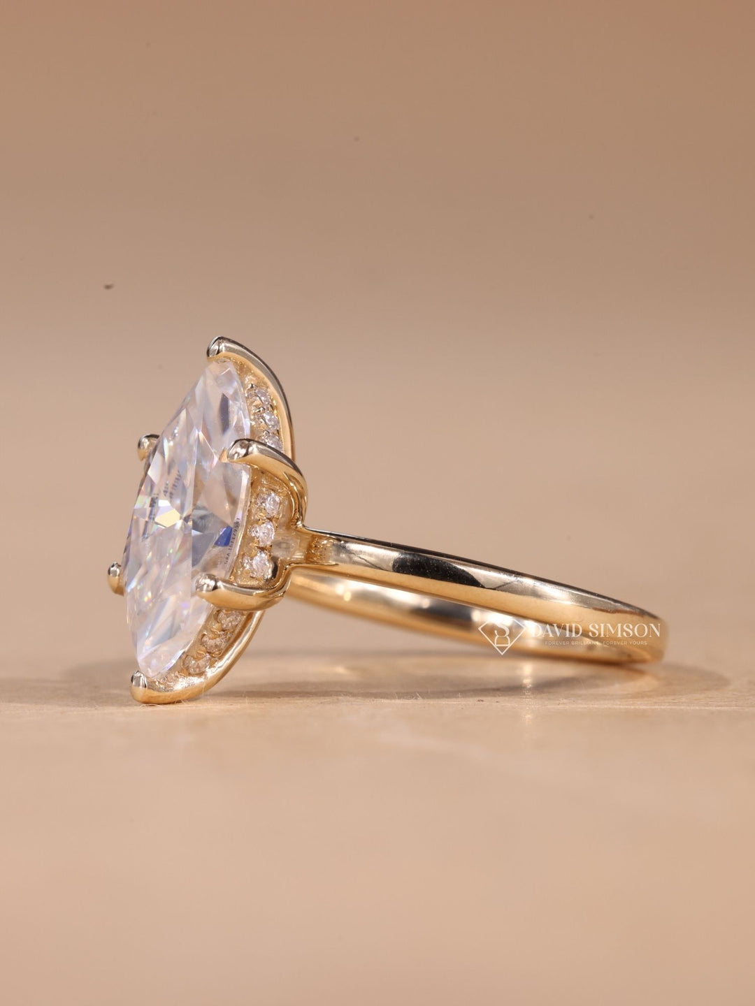 VVS1 moissanite jewelry
DEF colorless moissanite
Elongated marquise ring
