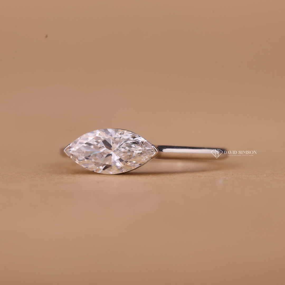 Ethical engagement ring Conflict free stone
Dainty marquise band
Solid gold jewelry