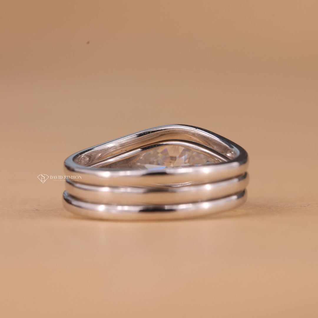 Contemporary Bridal
Eco Friendly Ring
Conflict Free Moissanite
Unique Marquise Setting
Trendy Engagement Ring
14k Gold Marquise Ring
East West Solitaire
