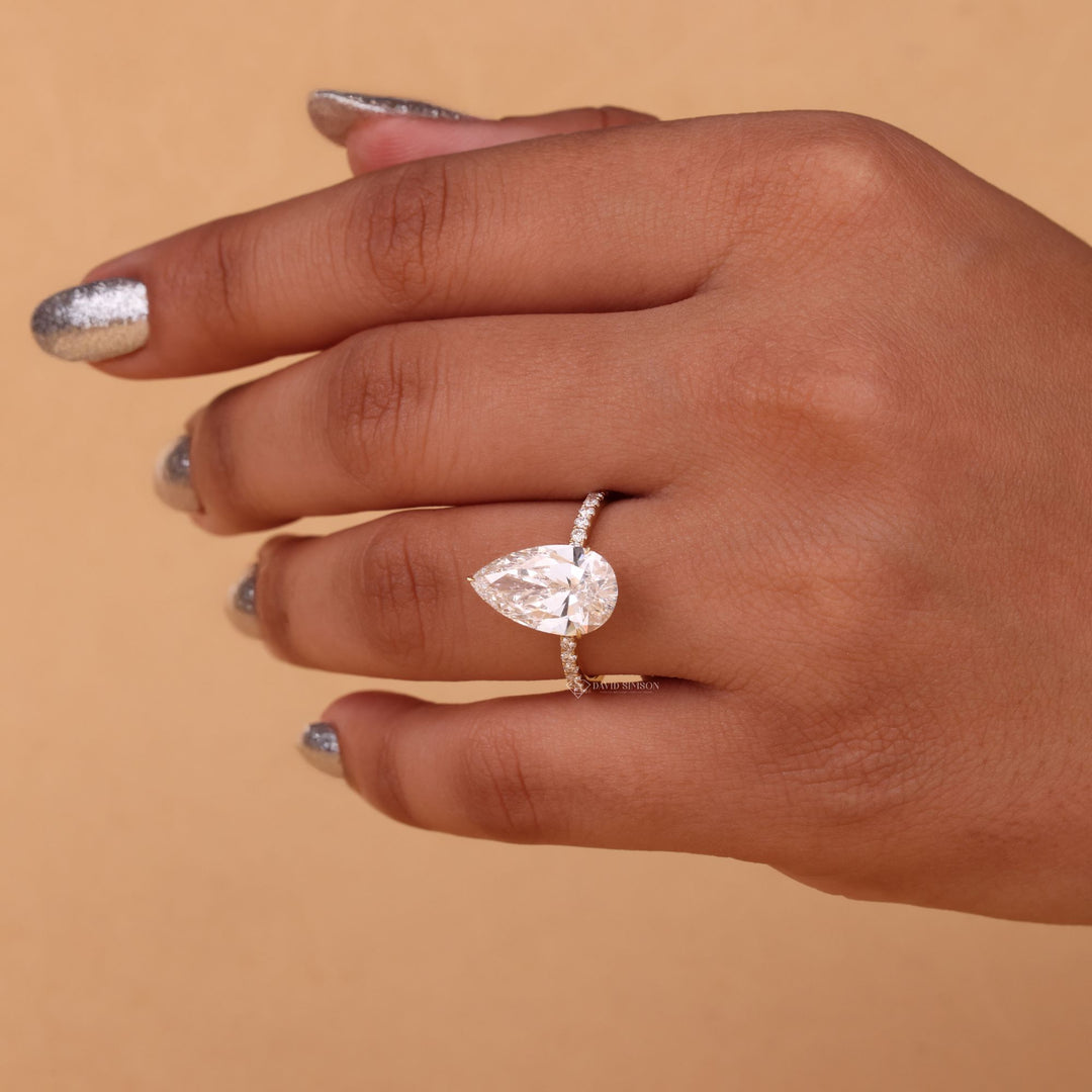 4 Carat Pear Ring
Teardrop Hidden Halo
14K Gold Pear Ring
Ethical Engagement Ring
VVS1 Pear Moissanite

