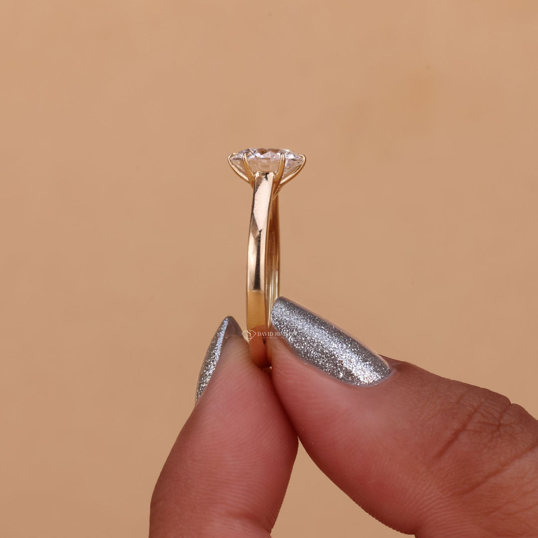 Lab Grown Round Ring
VVS1 Round Moissanite
White Gold Cathedral Ring
Rose Gold Moissanite Ring