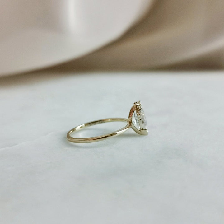 0-50-ct-oval-shaped-moissanite-cluster-engagement-ring