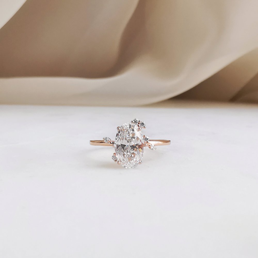 0-50-ct-oval-shaped-moissanite-cluster-engagement-ring