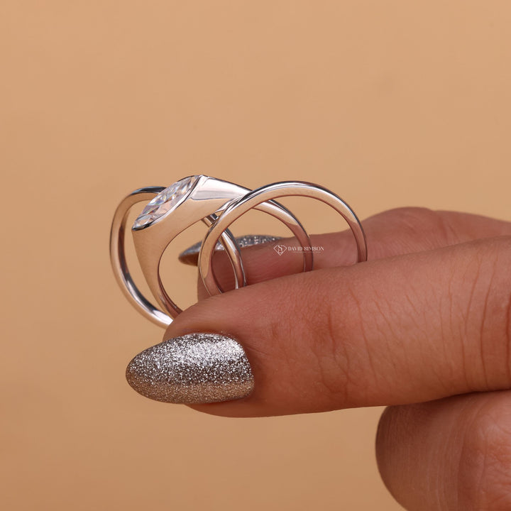Geometric Engagement Ring
Lab Grown Moissanite
Alternative Engagement Ring
Marquise Solitaire
Sleek Wedding Ring
Architectural Jewelry
