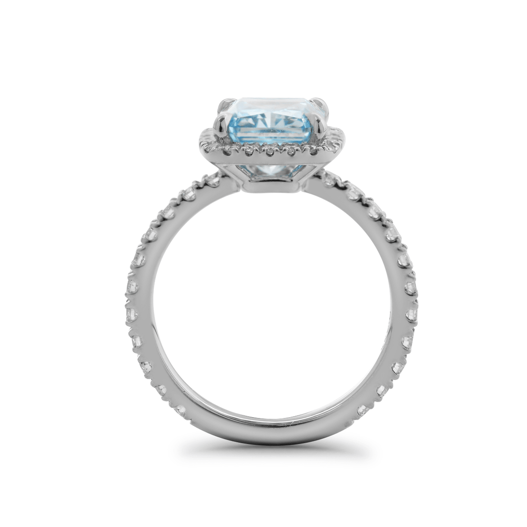 Two Tone Blue Diamond RingRadiant Cut Halo SettingExotic Blue Stone RingBlue Diamond Anniversary RingLarge Blue Diamond SolitaireBespoke Blue Diamond RingSustainable Blue Lab DiamondHigh-End Blue Jewelry
