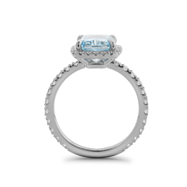 Two Tone Blue Diamond RingRadiant Cut Halo SettingExotic Blue Stone RingBlue Diamond Anniversary RingLarge Blue Diamond SolitaireBespoke Blue Diamond RingSustainable Blue Lab DiamondHigh-End Blue Jewelry