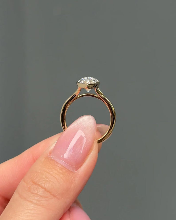 Geometric Diamond Ring
Conflict Free Diamond
Marquise Anniversary Ring
Premium Lab Diamond
Unique Marquise Ring
Protective Bezel Setting
Marquise Wedding Ring
