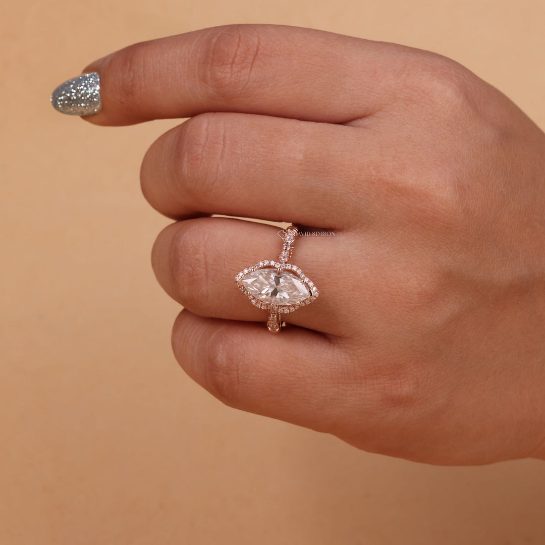 14K Gold Vintage Ring
18K Gold Marquise Ring
Platinum Marquise Halo
