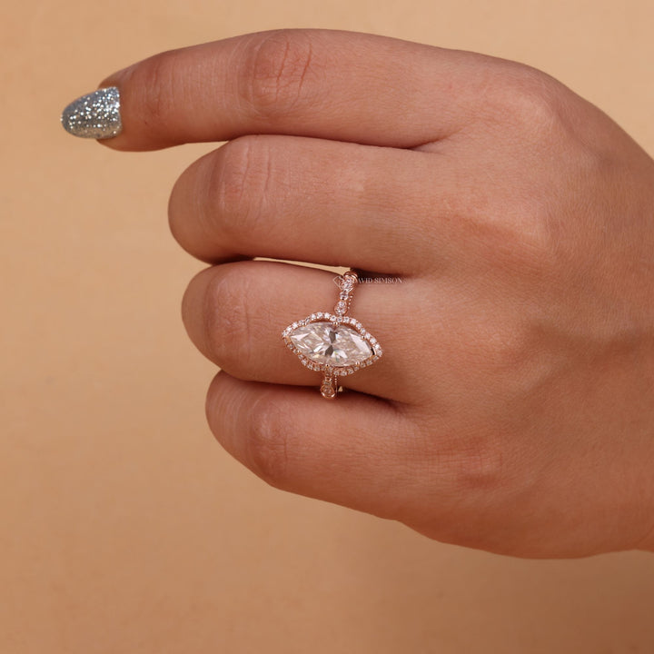 14K Gold Vintage Ring
18K Gold Marquise Ring
Platinum Marquise Halo
