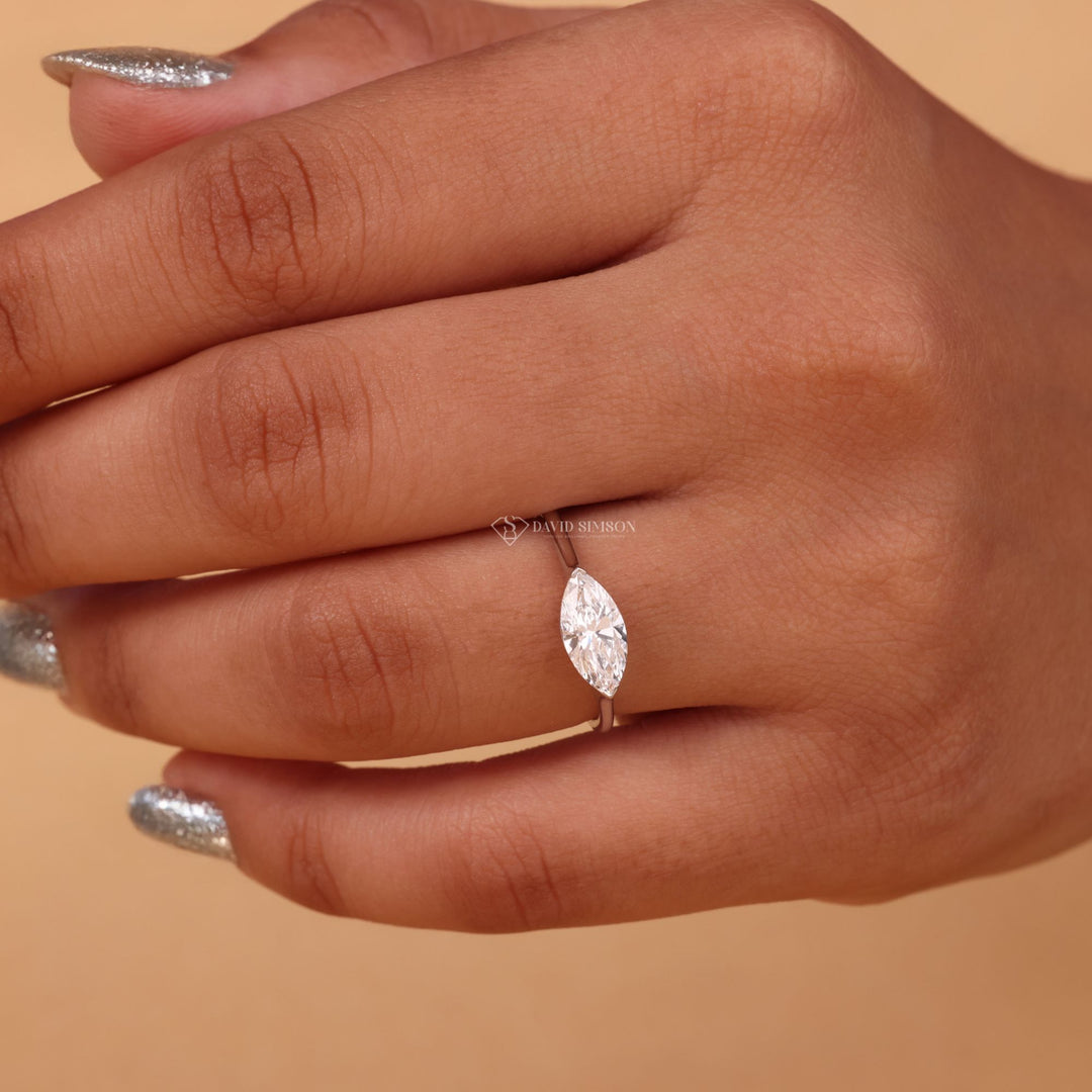East west solitaire
Marquise engagement ring
14k gold marquise ring